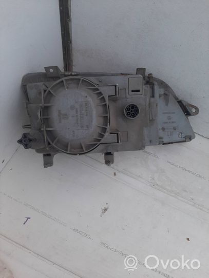 Opel Omega A Lampa przednia 03767748