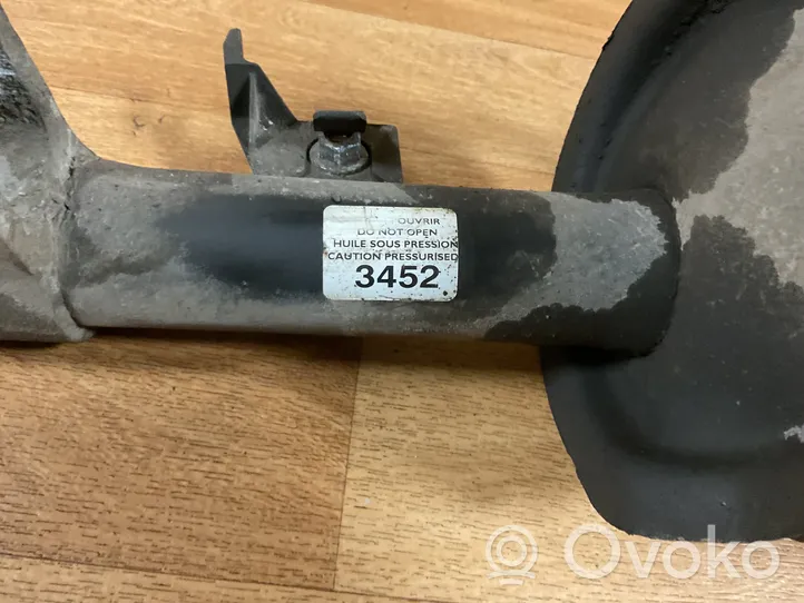 Citroen C4 I Etuiskunvaimennin kierrejousella 3452