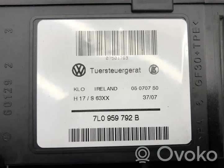 Volkswagen Touareg I Alzacristalli della portiera anteriore con motorino 7L0959792B