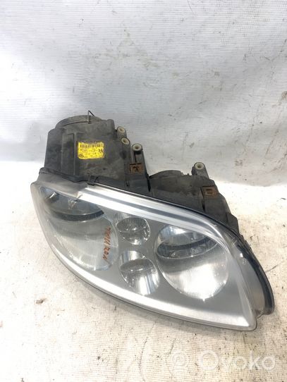 Volkswagen Touran I Lampa przednia 1T0941006R