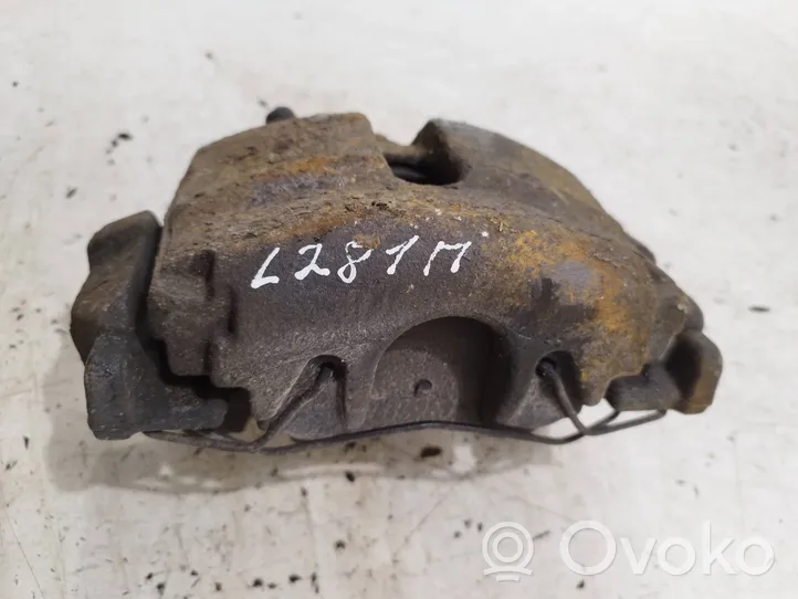 Volkswagen PASSAT B7 Front brake caliper 