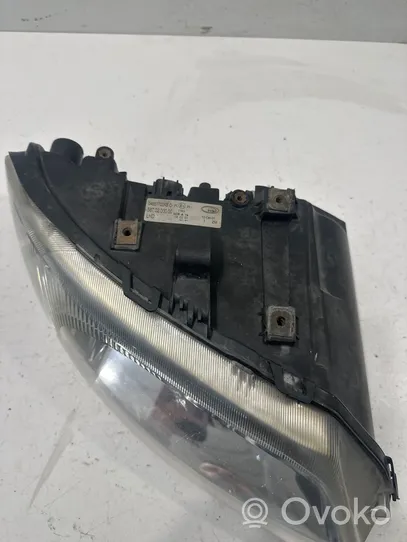 Chrysler Voyager Lampa przednia 04857702AB