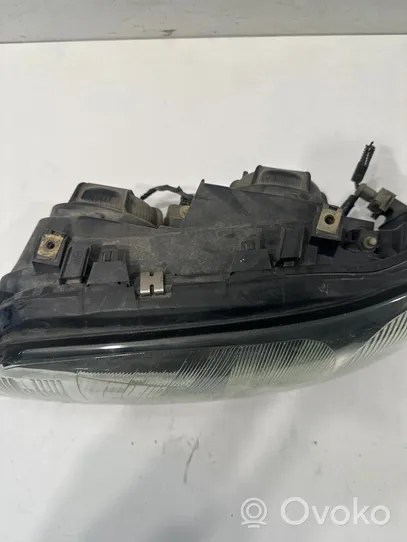 Volvo V70 Headlight/headlamp 8693547