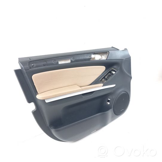 Volkswagen Touareg II Rivestimento del pannello della portiera anteriore A1647301470