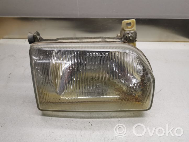 Ford Orion Lampa przednia 88AG13005A2A