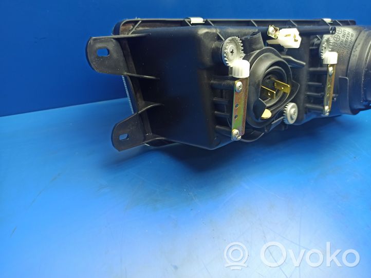 Mitsubishi Colt Faro delantero/faro principal 2141112LLDE