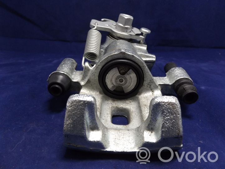 Nissan Sunny Caliper del freno trasero 0986473091