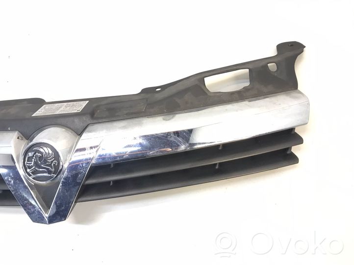 Opel Astra H Grille de calandre avant 13108471