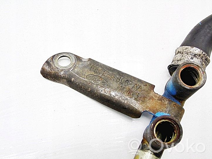 Ford Escort Tubo flessibile del liquido di raffreddamento del motore F5CE18696AA