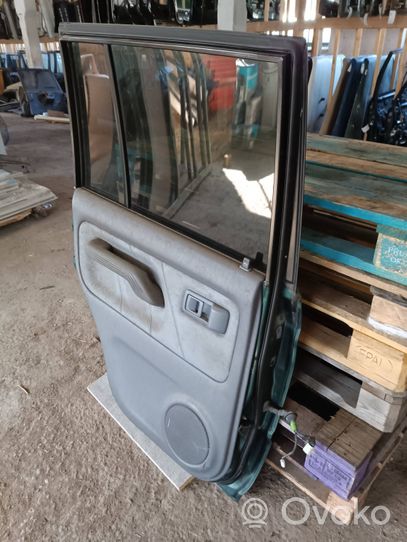 Toyota Land Cruiser (HDJ90) Rear door 