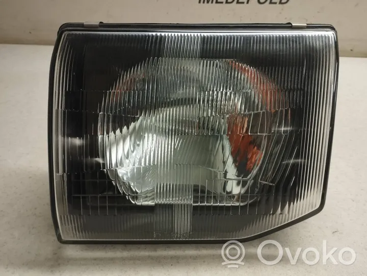 Mitsubishi Pajero Faro delantero/faro principal 203117016B