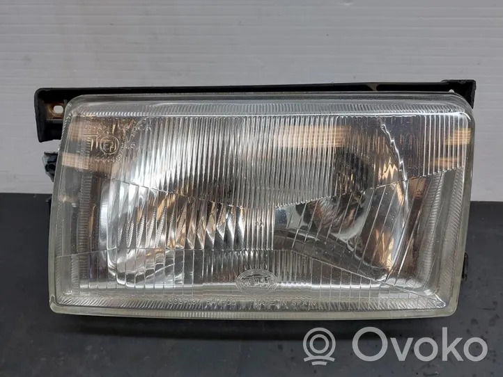 Volkswagen Polo II 86C 2F Lampa przednia 