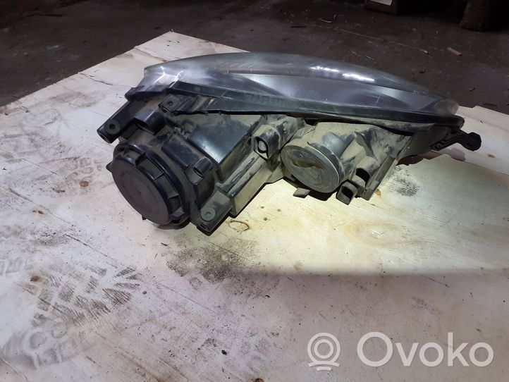 Volkswagen Golf V Lampa przednia 1K6941005Q