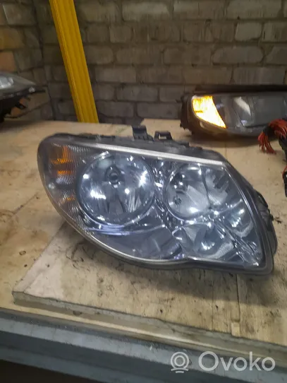 Chrysler Voyager Headlight/headlamp 04857830AC