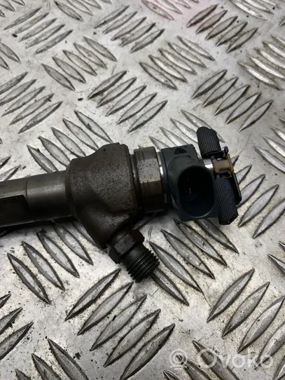 Volkswagen PASSAT B7 Fuel injector 03L130277J