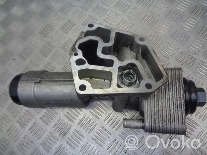 Volkswagen Sharan Supporto di montaggio del filtro dell’olio 038115389C