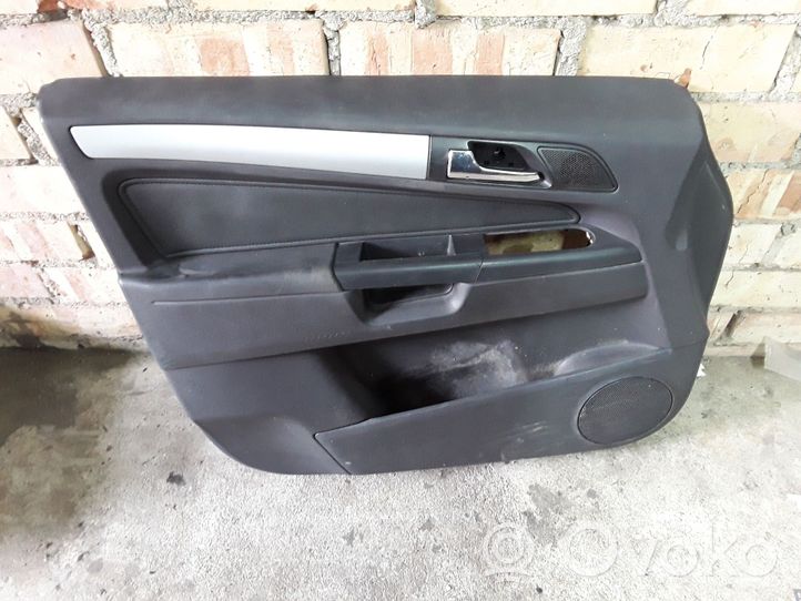 Opel Zafira B Garniture de panneau carte de porte avant 13266535