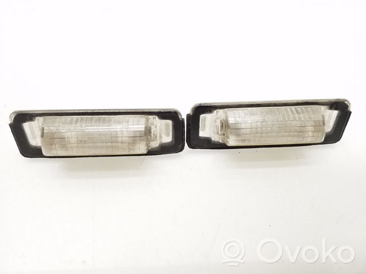 Mercedes-Benz E W210 Lampa oświetlenia tylnej tablicy rejestracyjnej 