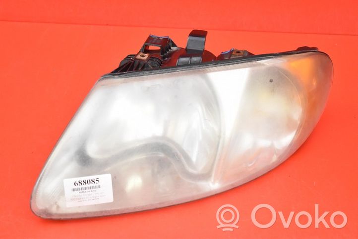 Chrysler Grand Voyager IV Lampa przednia 04857701AB