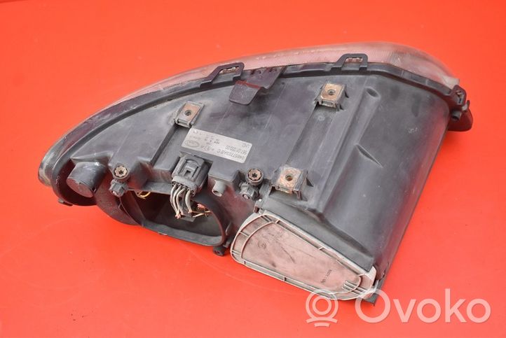 Chrysler Grand Voyager IV Lampa przednia 04857703AB