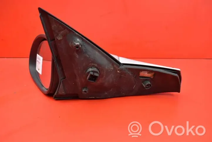 Opel Vectra B Front door electric wing mirror 0510411