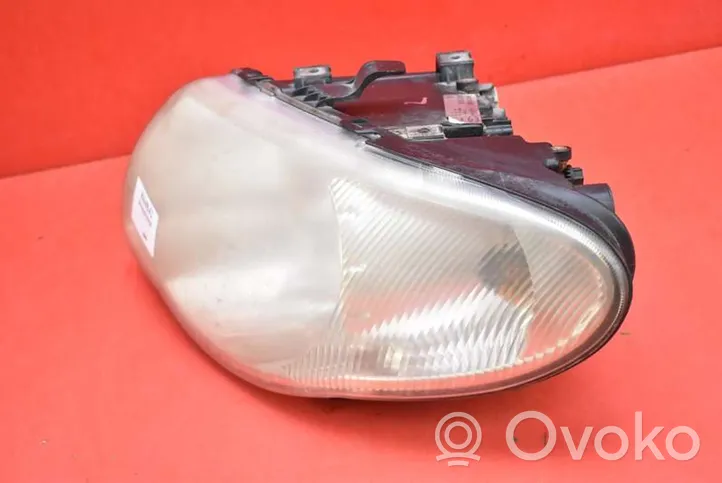 Chrysler Grand Voyager IV Phare frontale 04857831AC