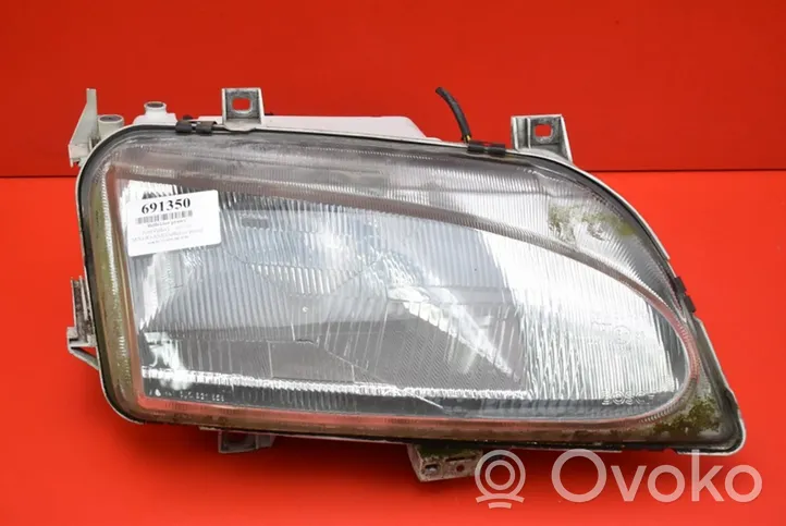 Ford Galaxy Lampa przednia 0301048312