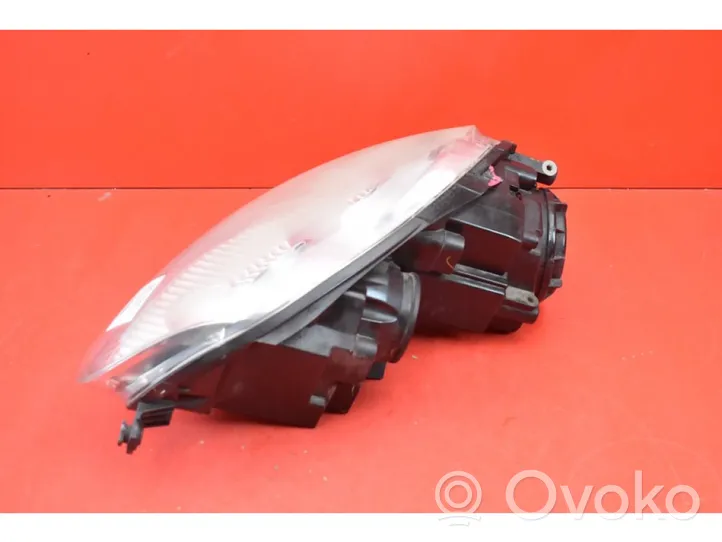 Volkswagen Golf V Lampa przednia 1K6941006P