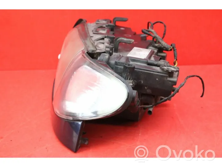 BMW X3 E83 Lampa przednia 0000