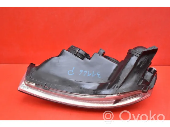 Opel Corsa C Lampa przednia 0000