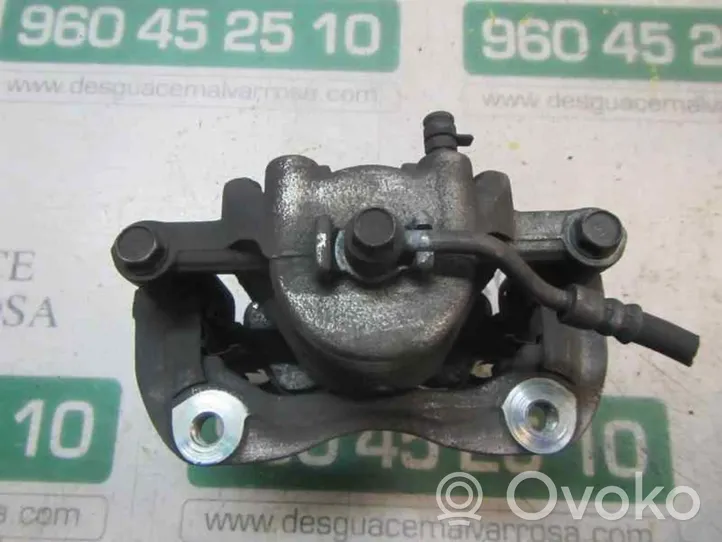 KIA Rio Zacisk hamulcowy przedni 581901RA00