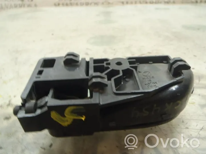 Subaru Impreza II Klamka wewnętrzna drzwi przednich 61051FE001ML