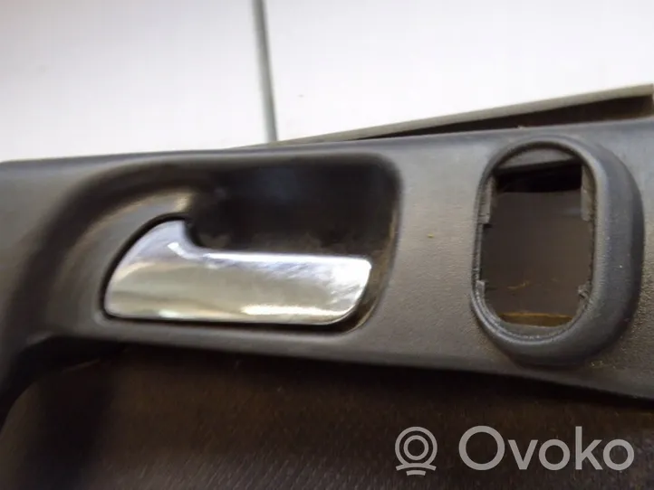 Opel Astra G Revestimiento de puerta delantera 024404573