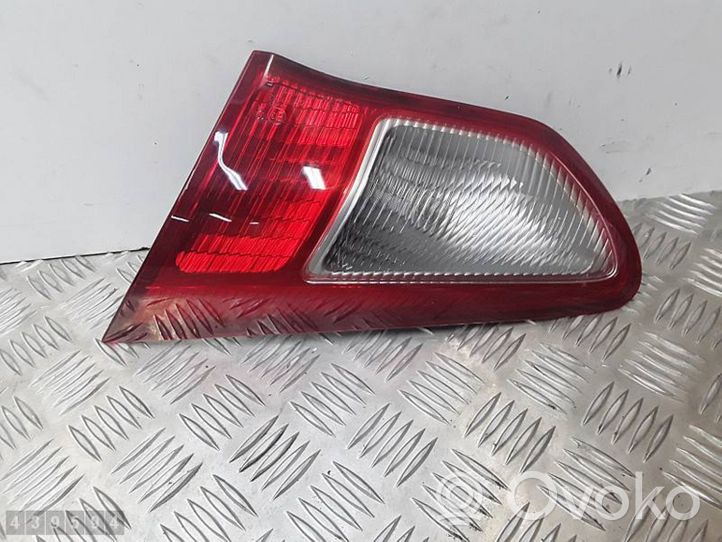 Mitsubishi Lancer VIII Aizmugurējais lukturis pārsegā 13287977