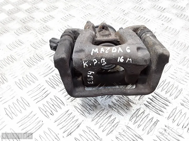 Mazda 6 Pinza del freno posteriore 32355597