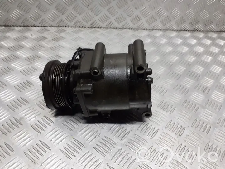 Ford Fusion Ilmastointilaitteen kompressorin pumppu (A/C) YS4H-19D629-AC