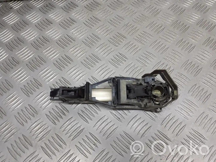 Volkswagen PASSAT B5 Support poignée extérieur de porte avant 