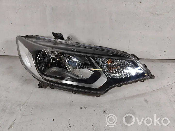 Honda Jazz Lampa przednia W1297