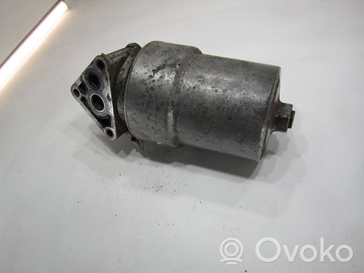 Volkswagen Golf III Supporto di montaggio del filtro dell’olio 021115403A