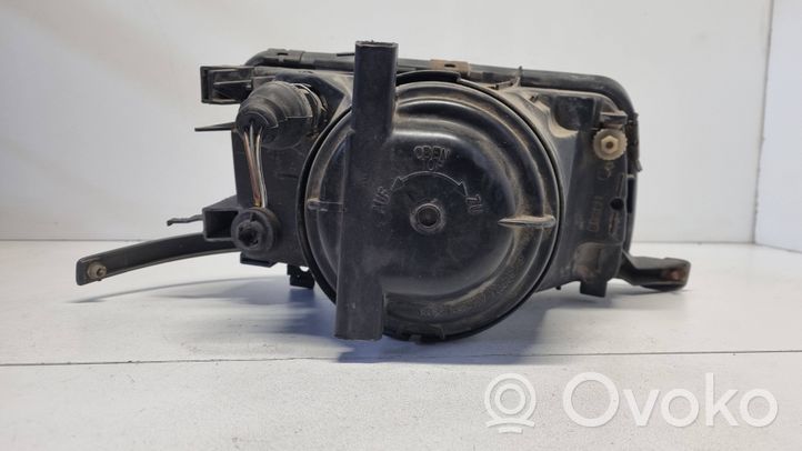 Audi 80 90 S2 B4 Staffa faro/fanale 0301075111