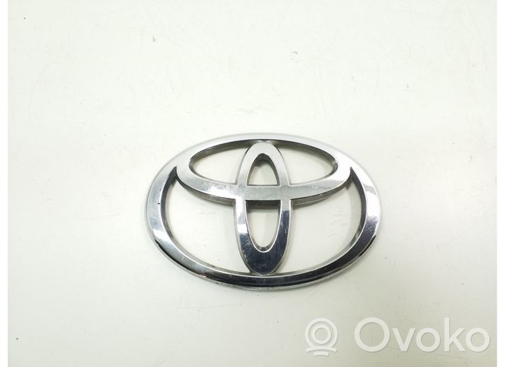 Toyota Land Cruiser (J100) Mostrina con logo/emblema della casa automobilistica 