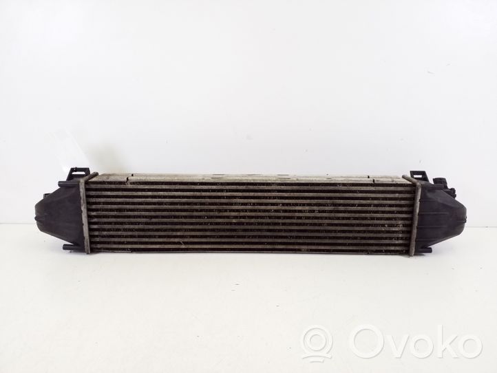 Volvo V60 Радиатор интеркулера 31338475