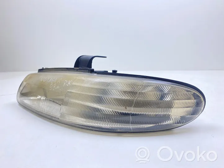 Chrysler Voyager Lampa przednia 04676521AEC