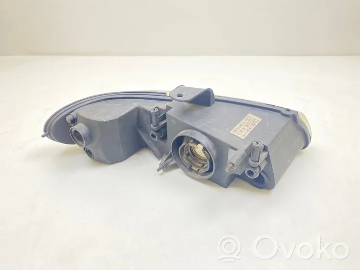 Chrysler Voyager Lampa przednia 04676521AEC