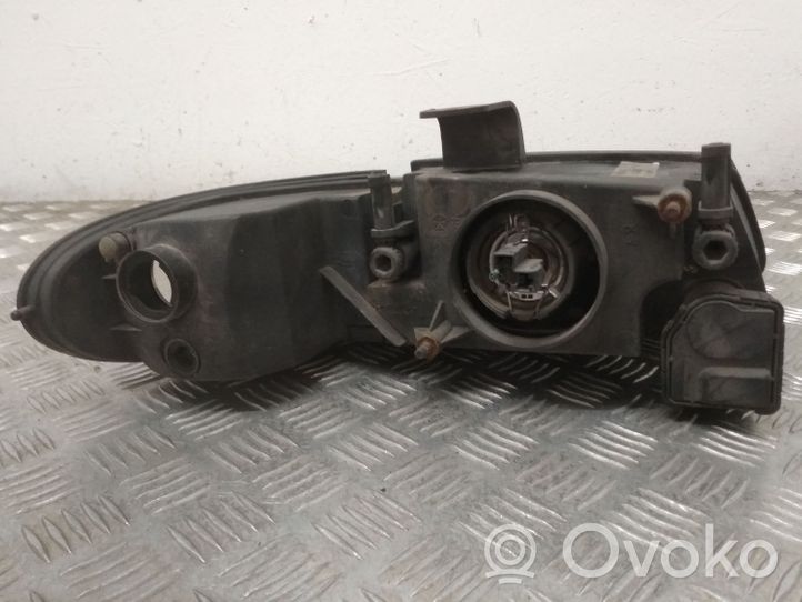 Chrysler Voyager Lampa przednia 04576313AB