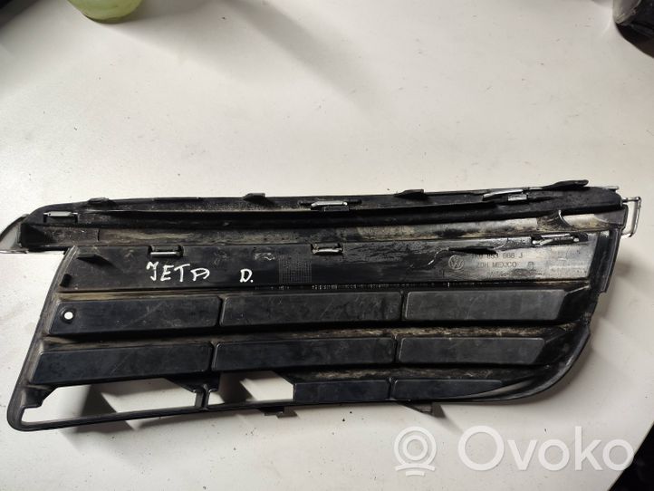 Volkswagen Jetta V Front fog light trim/grill 1K0853666J