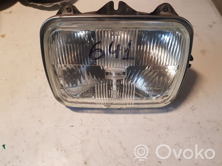 Mazda 323 Lampa przednia 104R7