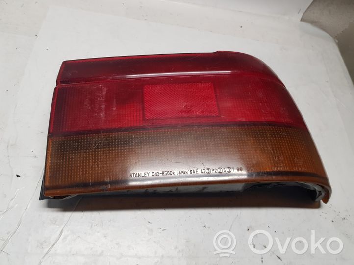 Mitsubishi Lancer Lampa tylna 0438560