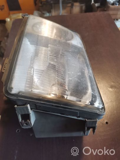 Mercedes-Benz E W124 Lampa przednia 12957900LI