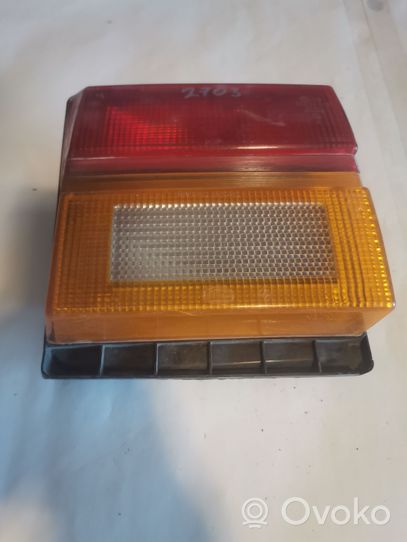 Audi 200 Lampy tylnej klapy bagażnika 443945225